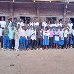 Students in front of new school rooms